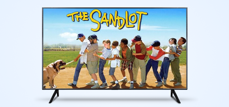TV screen showing "The Sandlot" movie poster.