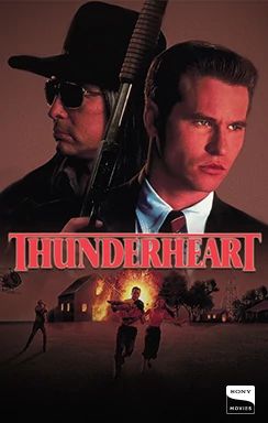 Thunderheart movie poster with two men in sunglasses and firearms.
