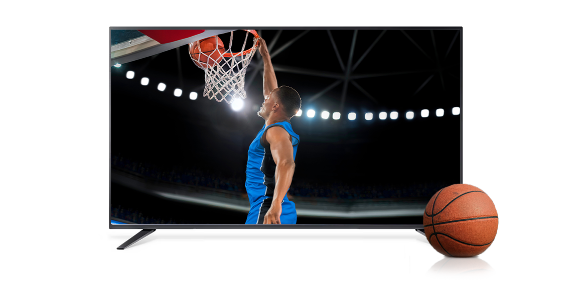 A smart TV is displayed showing a basketball player dunking a basketball