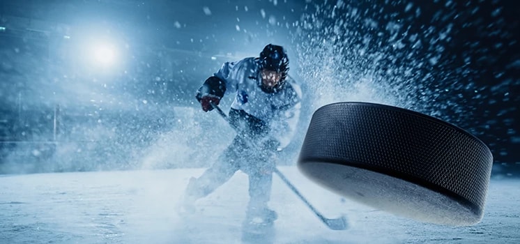 Pro hockey player on ice.